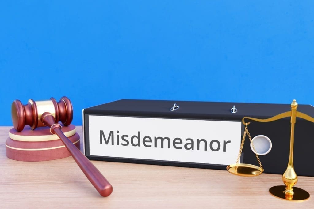 a sign that says misdemeanor