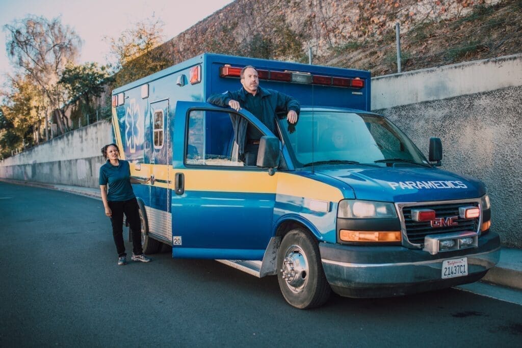 Emergency medical technicians operate an ambulance.