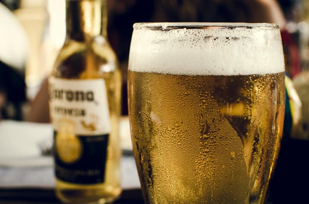 A bottle of beer and a glass of beer